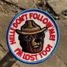 Vintage Smokey Bear patch that says "Hell! Don't Follow Me! I'm Lost Too!". 