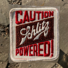 Vintage "Caution Schlitz Powered" beer patch