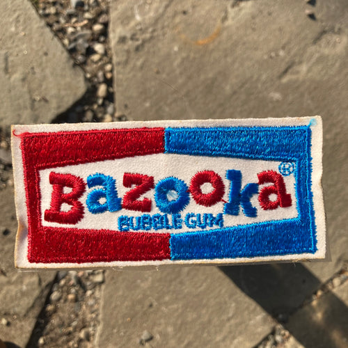 Vintage Bazooka Bubble Gum patch for sale. Unused, new old stock. Blue and Red embroidery on white felt.